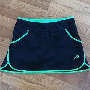 black and green tennis skirt